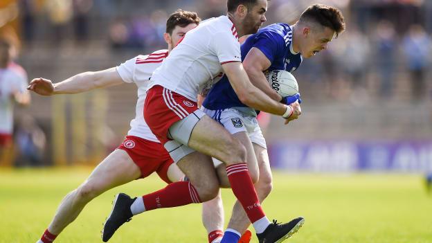 Dara McVeety of Cavan is tackled by Ronan McNamee,Tyrone, during the All-Ireland Senior Football Championship Round 4 Qualifier tie at St. Tiernach's Park in Clones.