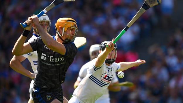 Séamus Callanan of Tipperary shoots past John Lennon of Laois to score his side's second goal during the All-Ireland SHC Senior quarter-final at Croke Park.
