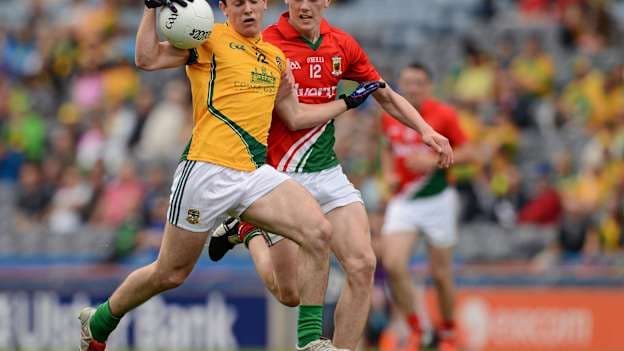 Meath's James McEntee in action with Mayo's Diarmuid O'Connor in the 2012 All-Ireland MFC semi-final.