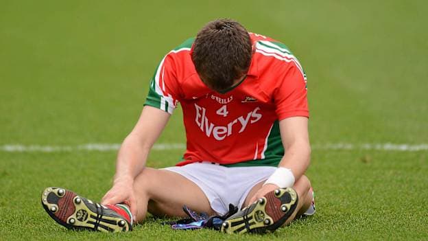 A dejected Michael Plunkett at the final whistle in 2012.