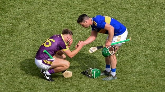 John O’Dwyer of Tipperary consoles Wexford's Aidan Nolan of Wexford after yesterday's game