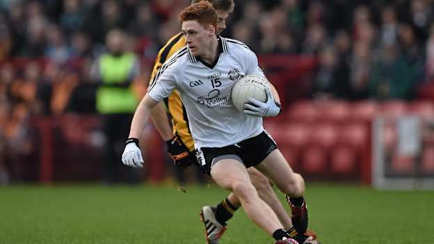 Meyler in action for Omagh St Enda's against Crossmaglen in the 2014 Ulster Club Championship
