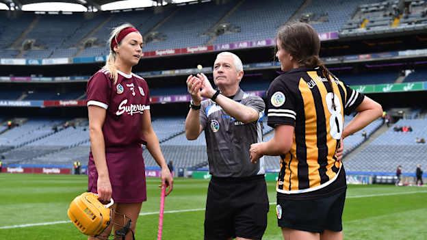 Referee Cathal Egan with team captains Sarah Dervan of Galway and Anna Farrell of Kilkenny before the Littlewoods Ireland Camogie League Division 1 Final match between Kilkenny and Galway at Croke Park in Dublin.