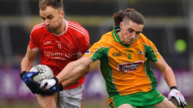 Jason Gibbons, Ballintubber, and Kieran Molloy, Corofin, during the AIB Connacht Club SFC Semi-Final at Tuam Stadium.