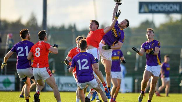 Niall Daly, Padraig Pearses, and David O'Gara, Roscommon Gaels, collide during the Roscommon SFC Final at Dr Hyde Park.