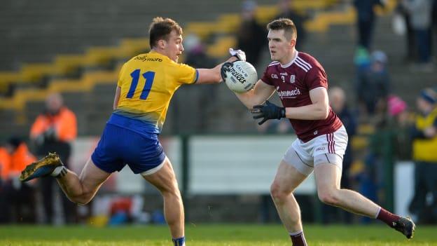 Cein D'arcy of Galway in action against Enda Smith of Roscommon during the Connacht FBD League Final between Roscommon and Galway at Dr. Hyde Park in Roscommon.