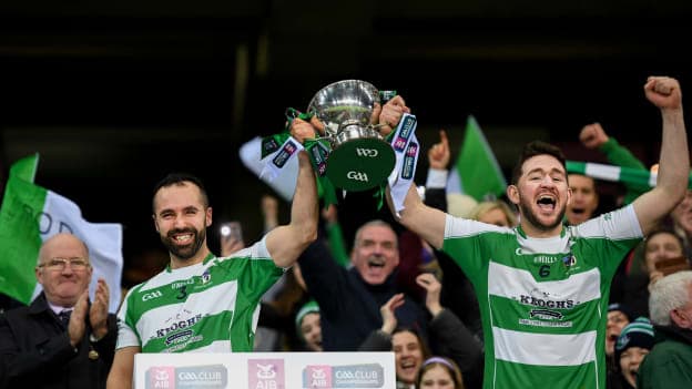 Oughterard's Eddie O'Sullivan, left, and Ronan Molloy lift the cup following the AIB GAA Football All-Ireland Intermediate Club Championship Final match between Magheracloone and Oughterard at Croke Park in Dublin.