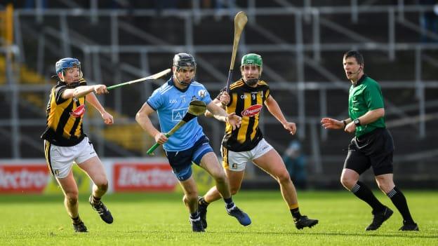 Danny Sutcliffe, Dublin, surrounded by John Donnelly and Alan Murphy, Kilkenny, at UPMC Nowlan Park.