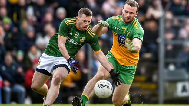 Joey Wallace, Meath, and Neil McGee, Donegal, collide at Pairc Tailteann.