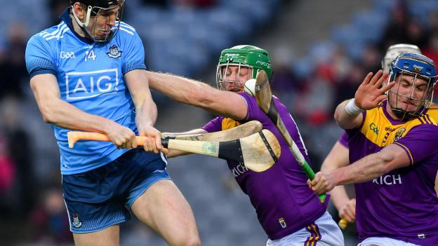 Ronan Hayes, Dublin, gets a shot away despite the efforts of Wexford's Matthew O'Hanlon and Kevin Foley at Croke Park.