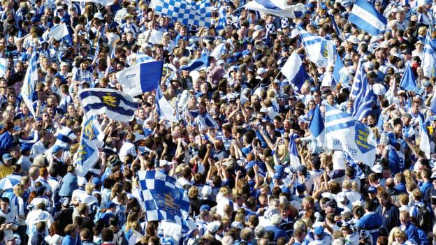 Waterford captain Ken McGrath is carried across the Semple Stadium pitch while holding the Munster Cup after victory over Cork in the 2004 Munster SHC Final.