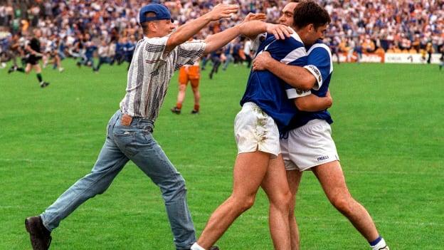 Bernard Morris, right, with Terry Farrelly celebrate their side's victory over Derry, following the Ulster GAA Football Senior Championship Final match between Cavan and Derry at St. Tiernach's Park in Clones, Monaghan. 