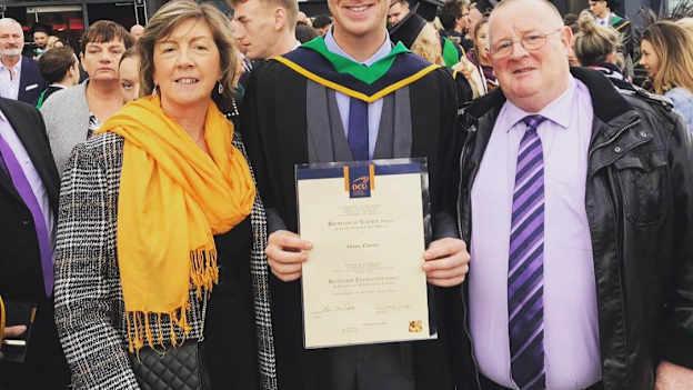 Shane Carthy pictured with his parents on his University graduation day. 