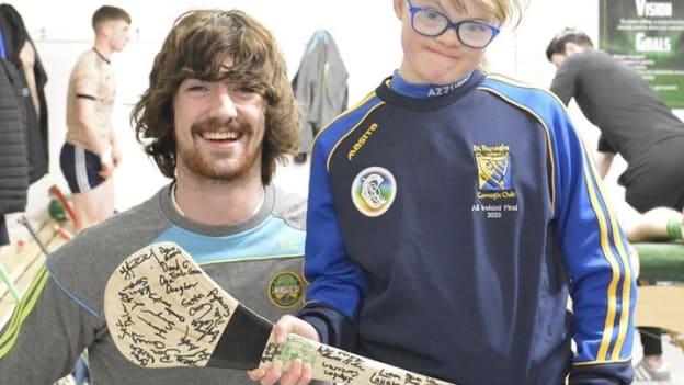 Ailis Malone pictured with Offaly senior hurling Captain Ben Conneely on a visit to Offaly training before the Covid-19 pandemic.