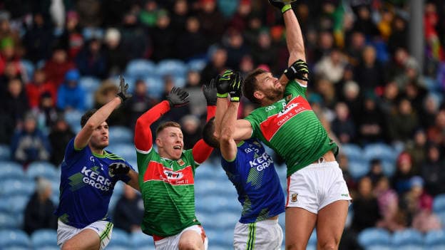 Aidan O'Shea, right, and Ryan O'Donoghue of Mayo contest a high ball with Graham O’Sullivan, left, and Shane Enright of Kerry during the Allianz Football League Division 1 Round 5 match between Mayo and Kerry at Elverys MacHale Park in Castlebar, Mayo.