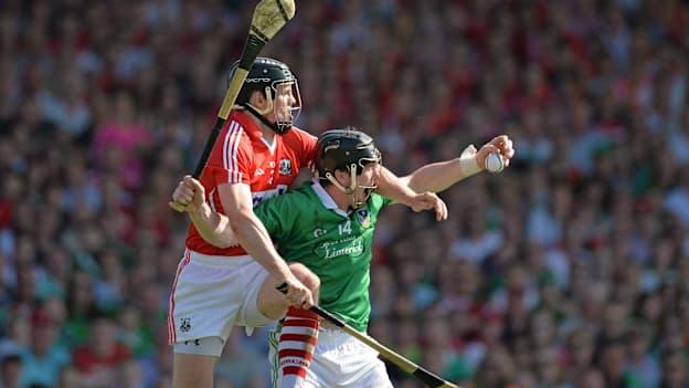 Limerick's Declan Hannon wins the ball ahead of Cork's Shane O'Neill in the 2013 Munster SHC Final. 