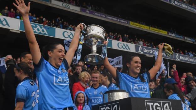 Sinéad Goldrick, left, and Hannah O'Neill of Dublin lift the the Brendan Martin Cup following the 2019 TG4 All-Ireland Ladies Football Senior Championship Final match between Dublin and Galway at Croke Park in Dublin. 