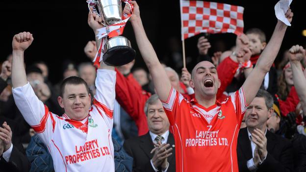 Loughgiel Shamrocks joint captains Damian Quinn, left, and Johnny Campbell lift the Tommy Moore Cup after victory over Coolderry in the 2012 AIB All-Ireland Club SHC Final. 