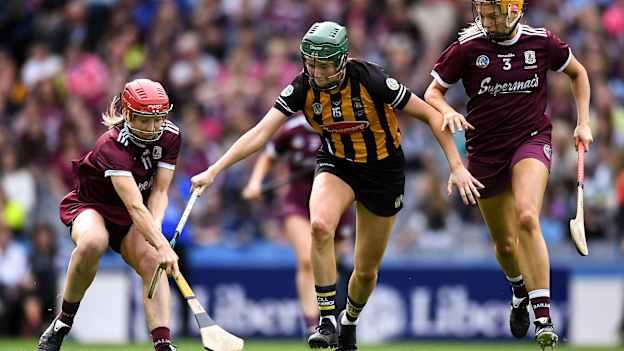 Caitriona Cormican of Galway, supported by team-mate Sarah Dervan, right, in action against Denise Gaule of Kilkenny during the 2019 Liberty Insurance All-Ireland Senior Camogie Championship Final match between Galway and Kilkenny at Croke Park in Dublin.