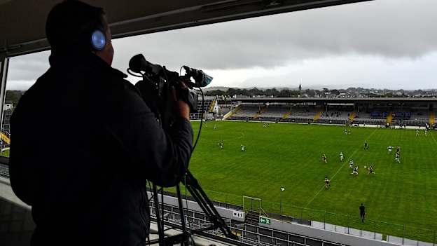 A general view of the action as a cameraman live streams the Kerry County Senior Club Football Championship Group 1 Round 1 match between Dr Crokes and Templenoe at Fitzgerald Stadium in Killarney, Kerry. 