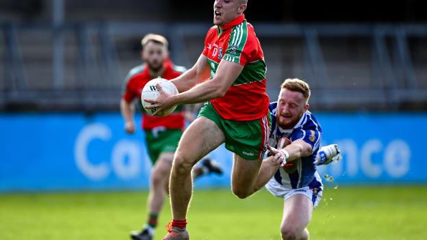 Paddy Small of Ballymun Kickhams is fouled by Darren O'Reilly of Ballyboden St Enda's during the Dublin County Senior 1 Football Championship Final match between Ballyboden St Enda's and Ballymun Kickhams at Parnell Park in Dublin. 