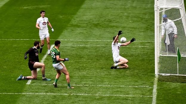 Jason Scully of Meath scores his side's fifth goal despite the efforts of Paddy Brophy of Kildare during the Leinster GAA Football Senior Championship Semi-Final match between Kildare and Meath at Croke Park in Dublin. 