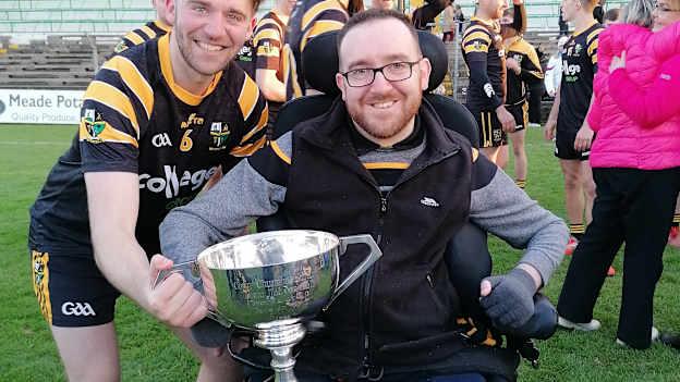 John O'Brien pictured with his brother Stephen (left) and the Mattie McDonnell Cup after Nobber's victory over Trim in the 2019 Meath Intermediate Football Final. 