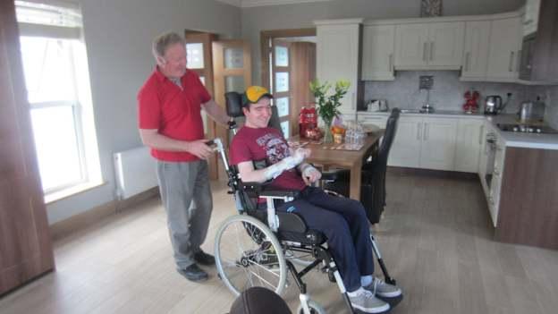 John O'Brien pictured shortly after moving into his specially adapted home which was built thanks to a fundraising drive by his Nobber GAA club and community. 