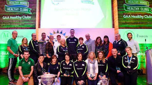 Dublin and Raheny footballer Brian Fenton, centre, with 'Hero Award' winners during the 2018 GAA National Healthy Club Conference at Croke Park Stadium, in Dublin. 