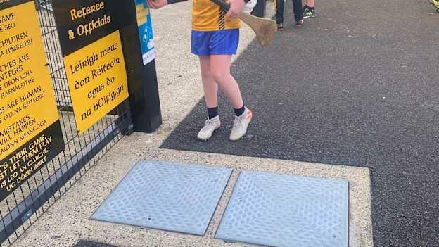Ballycastle juvenile players use the newly installed automatic hand-sanitiser dispenser at their grounds. 
