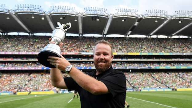 Shane Lowry holds up the Claret Jug in front of a packed house at Croke Park