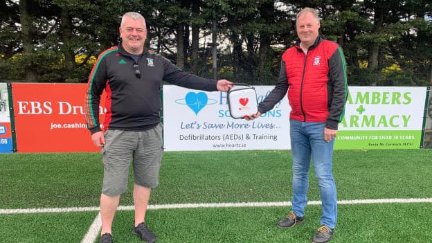 Ballymun Kickhams PRO Cathal Roche (left) with club Chairperson, Paul Ashton, and the defibrillator recently purchased by the club through the GAA's Community Heart Programme. 
