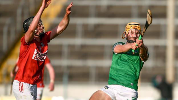 Darragh Fitzgibbon of Cork attempts to block a shot from Tom Morrisey of Limerick during the Munster GAA Hurling Senior Championship Semi-Final match between Cork and Limerick at Semple Stadium in Thurles, Tipperary. 