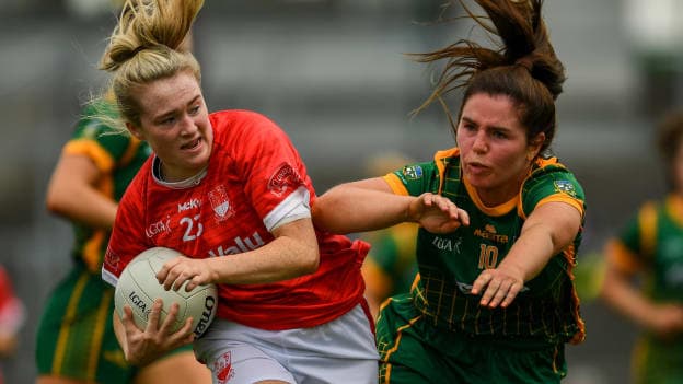 Eimear Kiely of Cork is tackled by Shauna Ennis of Meath during the TG4 All-Ireland Senior Ladies Football Championship Group 2 Round 1 match between Cork and Meath at St Brendan's Park in Birr, Offaly. 