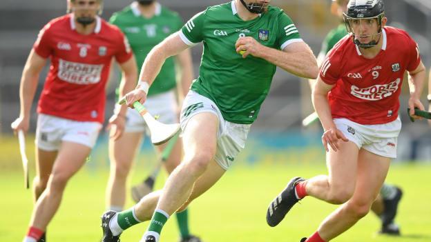 William O'Donoghue of Limerick in action against Ger Millerick of Cork during the Munster GAA Hurling Senior Championship Semi-Final match between Cork and Limerick at Semple Stadium in Thurles, Tipperary.