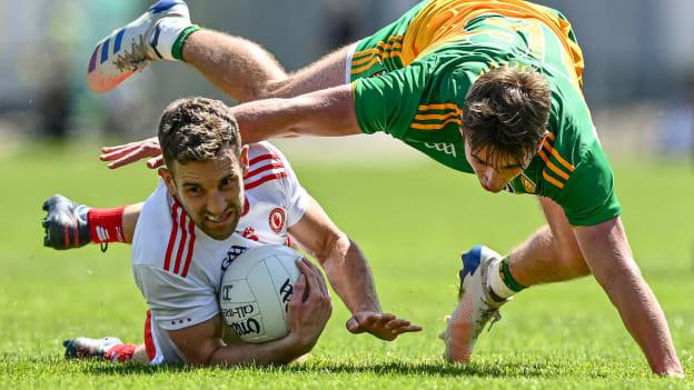 Niall Sludden of Tyrone in action against Peader Mogan of Donegal during the Ulster GAA Football Senior Championship Semi-Final match between Donegal and Tyrone at Brewster Park in Enniskillen, Fermanagh.