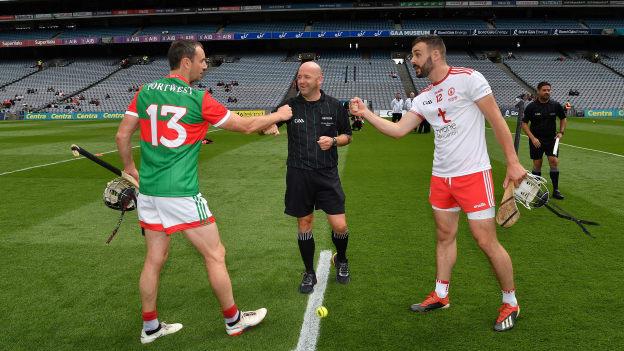 Referee Richie Fitzsimons with the two captains, Keith Higgins of Mayo and Damian Casey of Tyrone, before the Nickey Rackard Cup Final match between Tyrone and Mayo at Croke Park in Dublin. 