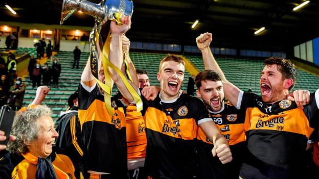 Austin Stacks captain Dylan Casey, centre, and teammates, from left, Shane O'Callaghan, Gearoid Fitzgerald and Barry Shanahan celebrate with the Bishop Moynihan Cup after the Kerry County Senior Football Championship Final match between Austin Stacks and Kerins O'Rahilly's at Austin Stack Park in Tralee, Kerry. 