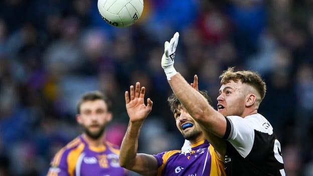 Aaron Morgan, Kilcoo, and Ben Shovlin, Kilmacud Crokes, during the AIB All Ireland Club SFC Final at Croke Park.