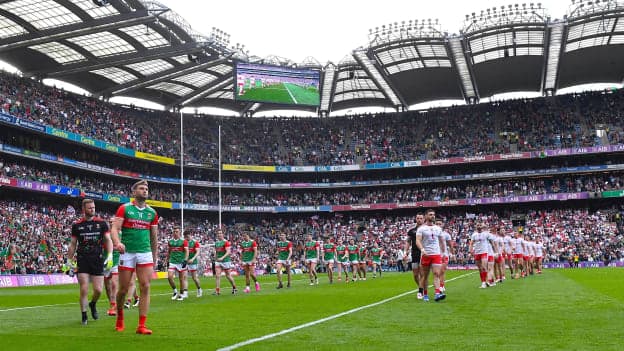 Dublin and Tyrone players parade before the 2021 All-Ireland Football Final. 