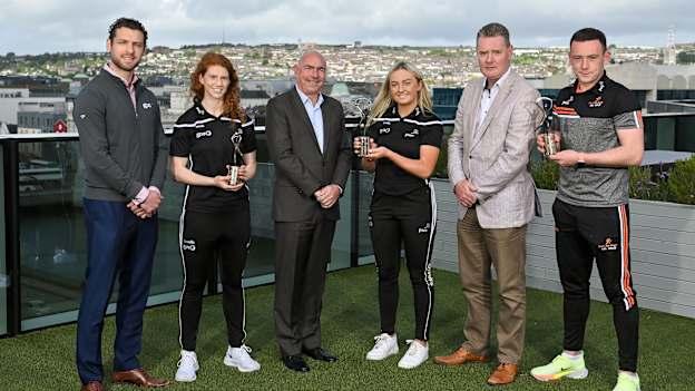 PwC GPA Players of the Month for March in camogie, Róisín McCormick of Antrim, centre, in ladies football, Louise Ní Mhuircheartaigh of Kerry, left, and PwC GAA/GPA Hurler of the Month for March Stephen Bennett of Waterford, right, are joined by, from left, GPA Chief Executive Tom Parsons, PwC Cork Senior Partner Ger O'Mahoney, and Munster GAA Vice Chairman Tim Murphy, at PwC's Cork offices. 