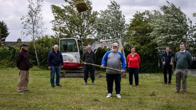 Jim Greene, centre, pictured turning the first sod on the now completed Community Playground located on the grounds of Mount Sion GAA club in Waterford. 