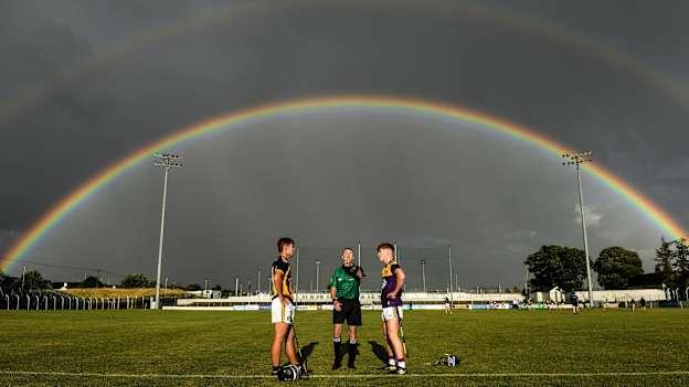Referee Thomas Gleeson with Kilkenny captain Harry Shine and Wexford captain Luke Murphy during the coin toss before the 2021 Electric Ireland Leinster Minor Hurling Championship Final match between Kilkenny and Wexford at Netwatch Cullen Park in Carlow. 