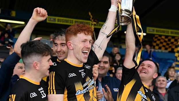Strokestown joint captains Diarmuid McGann, left, and David Neary lift the Fahey Cup after their side's victory in the Roscommon County Senior Club Football Championship Final match between Boyle and Strokestown at Dr Hyde Park in Roscommon. 
