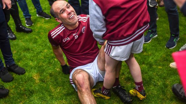 Paul Finlay of Ballybay, with his son, 9 year old, Aaron celebrate during the Monaghan County Senior Football Championship Final match between Scotstown and Ballybay Pearse Brothers at St Tiernach's Park in Clones, Monaghan.