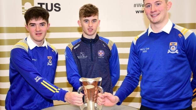 Cashel CS Joint Captains Ben Currivan (left) and Ronan Connolly (right) with Thurles CBS Captain Tommy Maher and the Dr. Harty Cup at the TUS Tipperary Campus Thurles SportsLab.