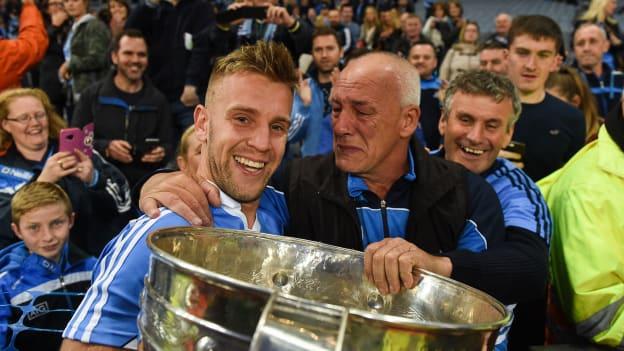 Jonny Cooper of Dublin celebrates with the Sam Maguire cup and his father Brendan after the 2016 GAA Football All-Ireland Senior Championship Final Replay match between Dublin and Mayo at Croke Park in Dublin. 