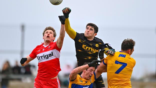 Derry's Odhran Lynch and Brendan Rogers, and Clare's Cathal O'Connor and Alan Sweeney in Allianz Football League Division Two action. Photo by Ben McShane/Sportsfile