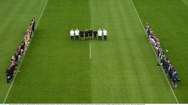 Referee James Molloy, his officials and members of both squads and management, stand during a minutes silence to honour the late Liam Kearns before the Allianz Football League Division 3 match between Tipperary and Offaly at FBD Semple Stadium in Thurles, Tipperary. Photo by Ray McManus/Sportsfile.
