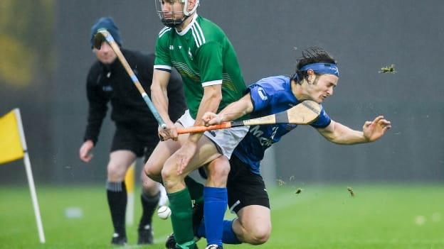 Joey Boyle of Ireland in action against Andrew King of Scotland during the Senior Hurling Shinty International 2019 match between Ireland and Scotland at the GAA National Games Development Centre in Abbotstown, Dublin. Photo by Piaras Ó Mídheach/Sportsfile